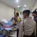 Polres Blitar Kota Gerak Cepat Bantu Evakuasi Pohon Tumbang Yang Menimpa PKL Akibat Angin Kencang