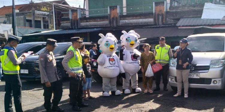 Polres Tabanan Terjunkan Personil PAM Giat Woro-woro dan Sosialisasi Pemilu 2024 dari KPU Kab. Tabanan