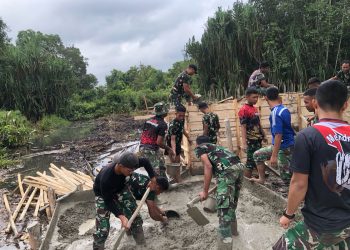 Semangat Satgas TMMD Kodim 0426 Tulang Bawang Tak Padam Meski Dihadang Rawa Dan Gambut