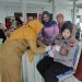 Dukung Pemerintah Tangani Stunting, Polwan Polres Mojokerto Bantu Sukseskan Posyandu.