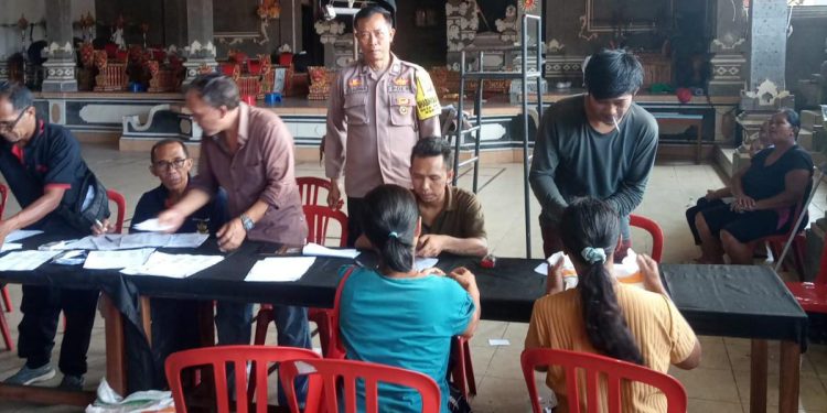 Polres Tabanan Kerahkan Seluruh Bhabinkamtibmas Kawal BPNT pembagian beras di Kabupaten Tabanan
