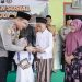 Kapolres Jombang Berikan Bansos ke TPQ Jama’atun Turipinggir, Megaluh